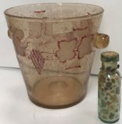A bubble glass ice pail of bucket form with puce painted and etched grape and vine decoration,