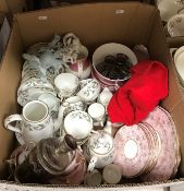 A box of assorted china wares to include a Crown Stafford floral decorated part coffee service,