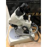 A Euromex Model KTD 39579 electric binocular microscope,