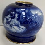 A Royal Doulton blue and white transfer decorated bulbous vase decorated with two young children in
