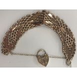A 9-carat pink gold gate link bracelet, 29.