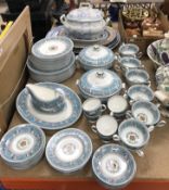 A Wedgwood "Florentine" (W2714) bone china turquoise banded dinner service comprising two vegetable