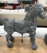 An early 20th Century vintage metal Mobo Bronco style ride-on horse,