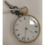 A 19th Century yellow metal mounted pocket watch, the white enamel dial set with Roman numerals,