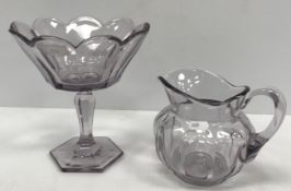 An early 20th Century lilac glass pedestal bowl, stamped "Chippendale Krystol" to interior, 21.
