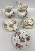 A collection of 19th Century and other Derby and or Derby type floral spray decorated pottery and