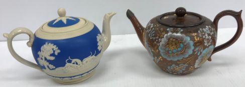 A collection of mainly 19th Century teapots including a Doulton Slater's "Lacework" teapot,