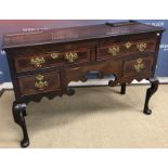 An oak and inlaid dresser in the North Country manner,