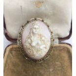 A 9 carat gold mounted shell cameo brooch / pendant decorated in high relief with glamorous