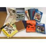 A bag containing a small collection of various topographical postcards,