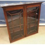 A 19th Century mahogany wall mounted display cabinet,