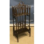 A circa 1900 bentwood and painted four section magazine rack in two tiers on turned supports (bears