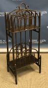 A circa 1900 bentwood and painted four section magazine rack in two tiers on turned supports (bears