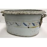 A French enamelled twin-handled jardiniere with scrolling decoration, 51 cm wide x 38.