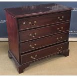 A modern mahogany chest,