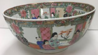 A 20th Century Chinese famille rose decorated punch bowl,