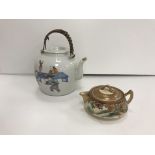 A 19th Century Chinese polychrome decorated teapot with figural decoration depicting "Various