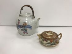 A 19th Century Chinese polychrome decorated teapot with figural decoration depicting "Various