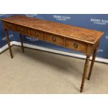 An oak side table in the early 19th Century manner,