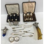 A collection of silver wares to include a cased set of five teaspoons,