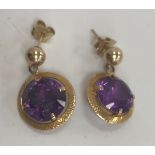 A pair of yellow metal mounted amethyst drop earrings, the stones approx 5 carat, approx 1.