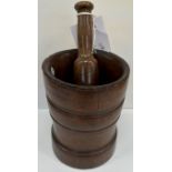 An 18th Century turned lignum vitae mortar and pestle,