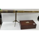 A 19th Century Negretti & Zambra of London brass cased five draw telescope on folding tripod stand,