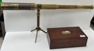 A 19th Century Negretti & Zambra of London brass cased five draw telescope on folding tripod stand,