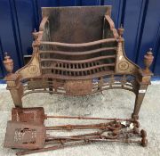 A 19th Century polished steel fire basket of serpentine shape with urn finials and raised on square