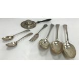 A collection of various silver cutlery including three Georgian tablespoons,