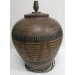 A modern pottery lamp with painted ethnic style decoration,