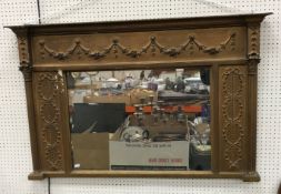 A 19th Century giltwood and gesso framed over mantel mirror,