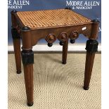 A 19th Century mahogany and ebonised stool in the manner of George Bullock,