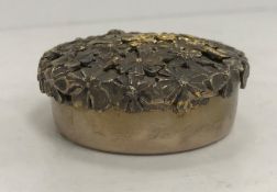 A Stuart Devlin silver and silver gilt circular trinket box,