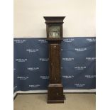 An oak cased long case clock, the 18th Century movement with square brass dial and single hand,