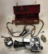 A Bolex zoom reflex P3 cine camera and leather covered case and a Bolex Paillard 18-5 cine camera