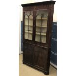 A 19th Century mahogany free standing corner cabinet,