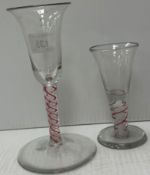 A Georgian enamel twist stem wine glass with white and red twist, 15 cm high, with large base, 8.