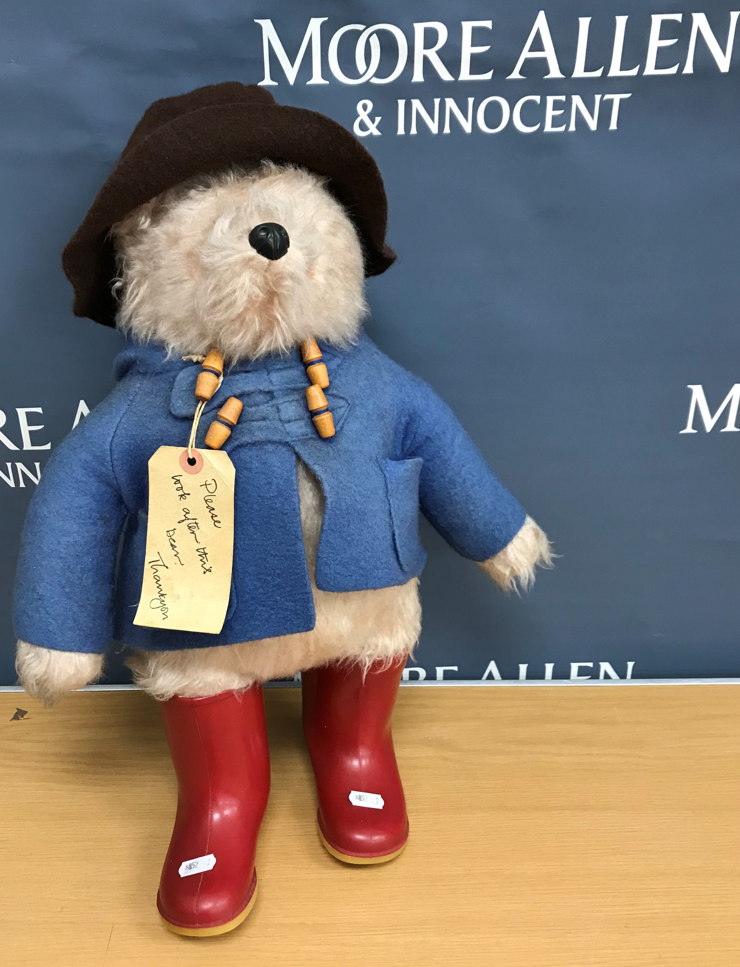 A 1972 Gabrielle Designs Ltd Paddington Bear in brown hat and blue coat 52 cm high together with a