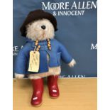 A 1972 Gabrielle Designs Ltd Paddington Bear in brown hat and blue coat 52 cm high together with a