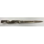 A Stuart Devlin silver paperknife with pierced twisted handle,