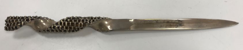 A Stuart Devlin silver paperknife with pierced twisted handle,