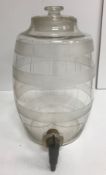 An early 20th Century cut glass spirit barrel with brass tap,