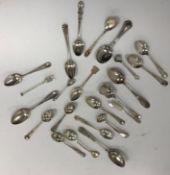 A collection of 21 various spoons including teaspoons, salts, mustards, caddy spoon, etc.