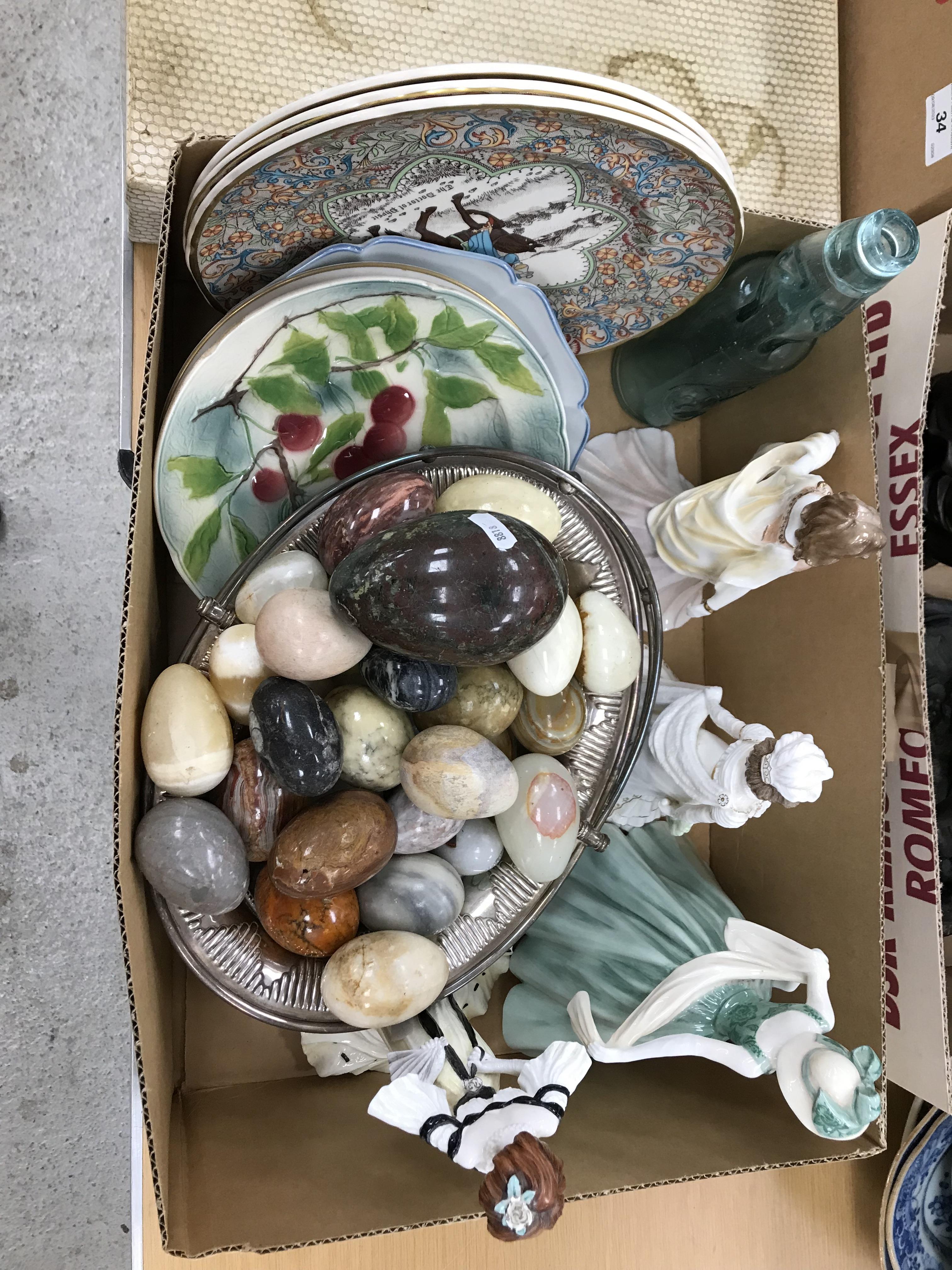 Two boxes of sundry decorative items to include a large collection of decorative stone eggs