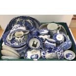 Two crates of assorted blue and white china to include "Willow" pattern wares,