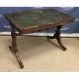 A Regency mahogany writing table, the tooled and gilded leather insert top within a moulded edge,