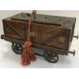 A vintage GWR oak smoker's companion box as a coal truck,