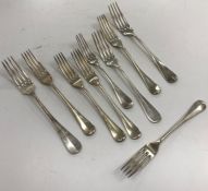 A set of three Alfenide white metal table forks,