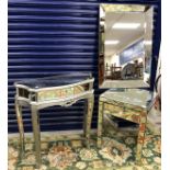 A modern silver painted and mirrored serpentine fronted single drawer side table in the Italianate